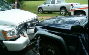car crash Front view of a black and white car dashed against the each other