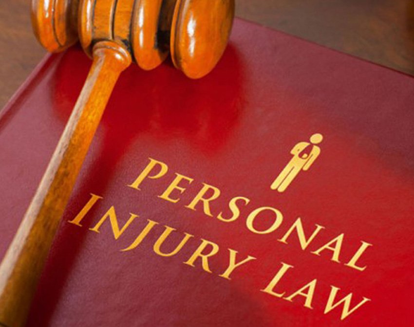 personal-injury A red book with Personal injury law written on it